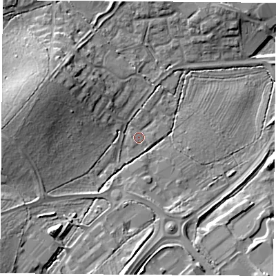 Shaded relief map of the ground around PO157JL, computed from Environment Agency LiDAR. The ground here sits at about 17 m above sea level and falls 16 m across the surrounding 800 m. Surface water reaching this point runs off ground lying to the west-north-west, 11.3 m higher.