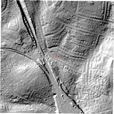 Shaded relief map of the ground around PO167PE, computed from Environment Agency LiDAR. The ground here sits at about 14 m above sea level and falls 26 m across the surrounding 800 m. Surface water reaching this point runs off ground lying to the north, 24.2 m higher.