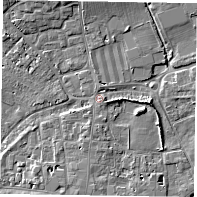Shaded relief map of the ground around PO191AT, computed from Environment Agency LiDAR. The ground here sits at about 14 m above sea level and falls 9 m across the surrounding 800 m. Surface water reaching this point runs off ground lying to the east, 6.0 m higher.