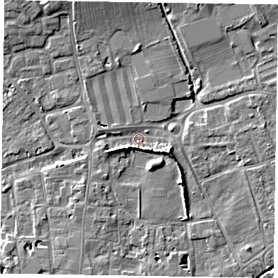 Shaded relief map of the ground around PO191BL, computed from Environment Agency LiDAR. The ground here sits at about 13 m above sea level and falls 9 m across the surrounding 800 m. Surface water reaching this point runs off ground lying to the north-east, 5.6 m higher.