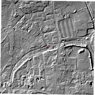 Shaded relief map of the ground around PO191BP, computed from Environment Agency LiDAR. The ground here sits at about 13 m above sea level and falls 9 m across the surrounding 800 m. Surface water reaching this point runs off ground lying to the south-south-east, 2.6 m higher.