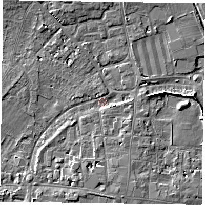 Shaded relief map of the ground around PO191DF, computed from Environment Agency LiDAR. The ground here sits at about 12 m above sea level and falls 9 m across the surrounding 800 m. Surface water reaching this point runs off ground lying to the east-south-east, 3.0 m higher.