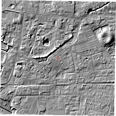 Shaded relief map of the ground around PO191JT, computed from Environment Agency LiDAR. The ground here sits at about 13 m above sea level and falls 11 m across the surrounding 800 m. Surface water reaching this point runs off ground lying to the north-north-west, 4.4 m higher.