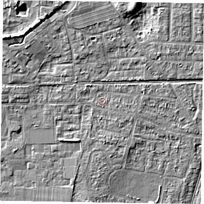 Shaded relief map of the ground around PO192UP, computed from Environment Agency LiDAR. The ground here sits at about 12 m above sea level and falls 7 m across the surrounding 800 m. Surface water reaching this point runs off ground lying to the east-north-east, 1.5 m higher.