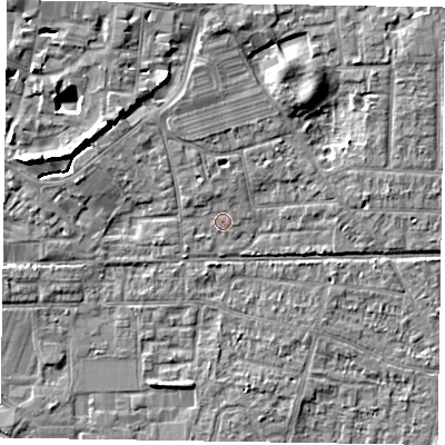 Shaded relief map of the ground around PO197DP, computed from Environment Agency LiDAR. The ground here sits at about 12 m above sea level and falls 7 m across the surrounding 800 m. Surface water reaching this point runs off ground lying to the north-north-west, 1.1 m higher.