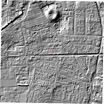 Shaded relief map of the ground around PO197DX, computed from Environment Agency LiDAR. The ground here sits at about 12 m above sea level and falls 7 m across the surrounding 800 m. Surface water reaching this point runs off ground lying to the north-east, 1.1 m higher.