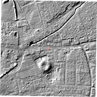 Shaded relief map of the ground around PO197JJ, computed from Environment Agency LiDAR. The ground here sits at about 13 m above sea level and falls 8 m across the surrounding 800 m. Surface water reaching this point runs off ground lying to the north-east, 5.2 m higher.