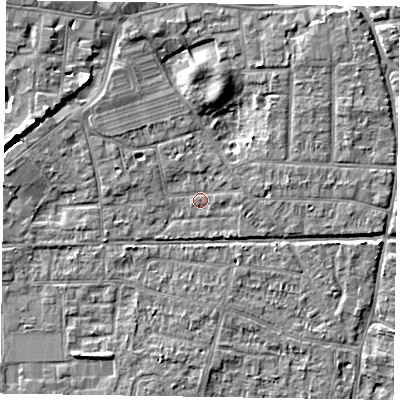 Shaded relief map of the ground around PO197PE, computed from Environment Agency LiDAR. The ground here sits at about 12 m above sea level and falls 7 m across the surrounding 800 m. Surface water reaching this point runs off ground lying to the north-east, 4.6 m higher.