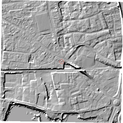 Shaded relief map of the ground around PO197TR, computed from Environment Agency LiDAR. The ground here sits at about 13 m above sea level and falls 10 m across the surrounding 800 m. Surface water reaching this point runs off ground lying to the north-north-west, 2.4 m higher.