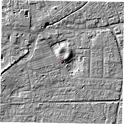 Shaded relief map of the ground around PO197UR, computed from Environment Agency LiDAR. The ground here sits at about 13 m above sea level and falls 7 m across the surrounding 800 m. Surface water reaching this point runs off ground lying to the north-east, 5.6 m higher.