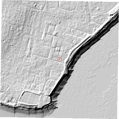 Shaded relief map of the ground around PO200TX, computed from Environment Agency LiDAR. The ground here sits at about 5 m above sea level and falls 11 m across the surrounding 800 m. Surface water reaching this point runs off ground lying to the south-west, 3.2 m higher.