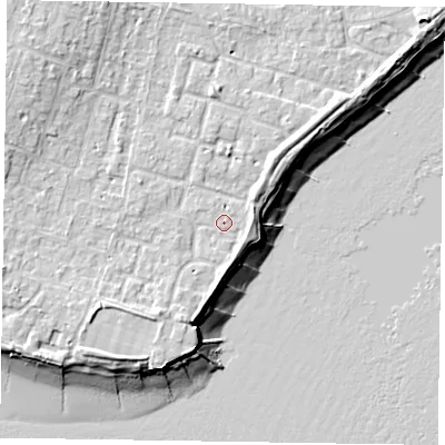 Shaded relief map of the ground around PO200UD, computed from Environment Agency LiDAR. The ground here sits at about 5 m above sea level and falls 11 m across the surrounding 800 m. Surface water reaching this point runs off ground lying to the south-west, 2.8 m higher.
