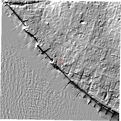 Shaded relief map of the ground around PO209DD, computed from Environment Agency LiDAR. The ground here sits at about 6 m above sea level and falls 11 m across the surrounding 800 m. Surface water reaching this point runs off ground lying to the east-north-east, 2.2 m higher.