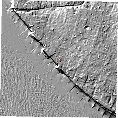 Shaded relief map of the ground around PO209DG, computed from Environment Agency LiDAR. The ground here sits at about 7 m above sea level and falls 11 m across the surrounding 800 m. Surface water reaching this point runs off ground lying to the east-north-east, 2.5 m higher.