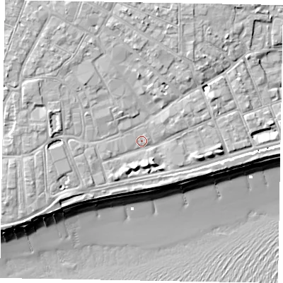 Shaded relief map of the ground around PO211LY, computed from Environment Agency LiDAR. The ground here sits at about 5 m above sea level and falls 11 m across the surrounding 800 m. Surface water reaching this point runs off ground lying to the west-north-west, 3.4 m higher.
