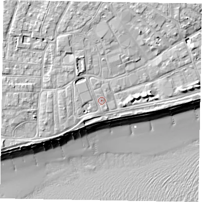 Shaded relief map of the ground around PO211ND, computed from Environment Agency LiDAR. The ground here sits at about 6 m above sea level and falls 10 m across the surrounding 800 m. Surface water reaching this point runs off ground lying to the west, 1.6 m higher.