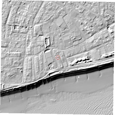 Shaded relief map of the ground around PO211SU, computed from Environment Agency LiDAR. The ground here sits at about 6 m above sea level and falls 10 m across the surrounding 800 m. The ground contributing surface water to this point lies to the north.