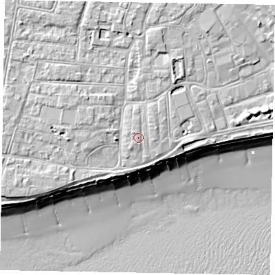 Shaded relief map of the ground around PO211TX, computed from Environment Agency LiDAR. The ground here sits at about 6 m above sea level and falls 10 m across the surrounding 800 m. Surface water reaching this point runs off ground lying to the north-west, 0.8 m higher.