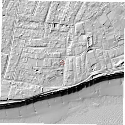 Shaded relief map of the ground around PO211XE, computed from Environment Agency LiDAR. The ground here sits at about 6 m above sea level and falls 10 m across the surrounding 800 m. Surface water reaching this point runs off ground lying to the north-north-east, 2.3 m higher.