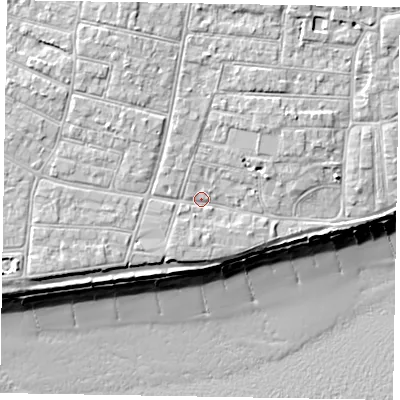 Shaded relief map of the ground around PO212NP, computed from Environment Agency LiDAR. The ground here sits at about 6 m above sea level and falls 10 m across the surrounding 800 m. Surface water reaching this point runs off ground lying to the north-north-west, 2.3 m higher.