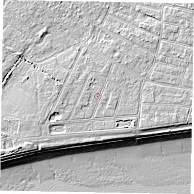 Shaded relief map of the ground around PO212QT, computed from Environment Agency LiDAR. The ground here sits at about 6 m above sea level and falls 10 m across the surrounding 800 m. Surface water reaching this point runs off ground lying to the north, 0.8 m higher.