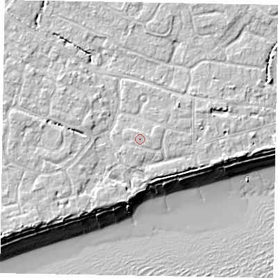 Shaded relief map of the ground around PO214AH, computed from Environment Agency LiDAR. The ground here sits at about 6 m above sea level and falls 10 m across the surrounding 800 m. Surface water reaching this point runs off ground lying to the east-north-east, 0.7 m higher.