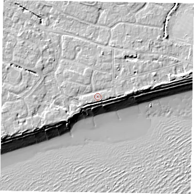 Shaded relief map of the ground around PO214AS, computed from Environment Agency LiDAR. The ground here sits at about 6 m above sea level and falls 10 m across the surrounding 800 m. Surface water reaching this point runs off ground lying to the north-north-east, 1.3 m higher.