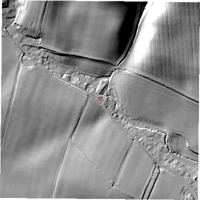Shaded relief map of the ground around PO303AE, computed from Environment Agency LiDAR. The ground here sits at about 24 m above sea level and falls 38 m across the surrounding 800 m. Surface water reaching this point runs off ground lying to the north, 28.2 m higher.