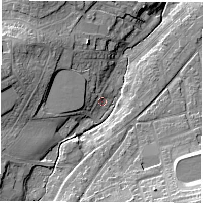 Shaded relief map of the ground around PO305DT, computed from Environment Agency LiDAR. The ground here sits at about 12 m above sea level and falls 26 m across the surrounding 800 m. Surface water reaching this point runs off ground lying to the west-north-west, 6.4 m higher.