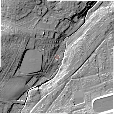 Shaded relief map of the ground around PO305DU, computed from Environment Agency LiDAR. The ground here sits at about 11 m above sea level and falls 23 m across the surrounding 800 m. Surface water reaching this point runs off ground lying to the west, 11.0 m higher.
