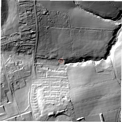 Shaded relief map of the ground around PO305PN, computed from Environment Agency LiDAR. The ground here sits at about 12 m above sea level and falls 39 m across the surrounding 800 m. Surface water reaching this point runs off ground lying to the north-west, 31.3 m higher.