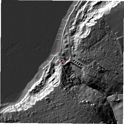 Shaded relief map of the ground around PO318LD, computed from Environment Agency LiDAR. The ground here sits at about 9 m above sea level and falls 44 m across the surrounding 800 m. Surface water reaching this point runs off ground lying to the south, 12.3 m higher.