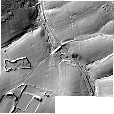 Shaded relief map of the ground around PO334BE, computed from Environment Agency LiDAR. The ground here sits at about 11 m above sea level and falls 35 m across the surrounding 800 m. Surface water reaching this point runs off ground lying to the south-south-east, 12.7 m higher.