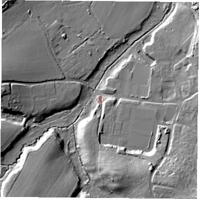 Shaded relief map of the ground around PO369PF, computed from Environment Agency LiDAR. The ground here sits at about 15 m above sea level and falls 25 m across the surrounding 800 m. Surface water reaching this point runs off ground lying to the south, 19.5 m higher.