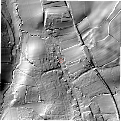 Shaded relief map of the ground around PO382QG, computed from Environment Agency LiDAR. The ground here sits at about 64 m above sea level and falls 48 m across the surrounding 800 m. Surface water reaching this point runs off ground lying to the east-north-east, 33.1 m higher.