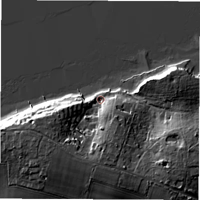 Shaded relief map of the ground around PO410XF, computed from Environment Agency LiDAR. The ground here sits at about 2 m above sea level and falls 18 m across the surrounding 800 m. Surface water reaching this point runs off ground lying to the south, 13.8 m higher.