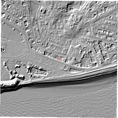 Shaded relief map of the ground around PO52HN, computed from Environment Agency LiDAR. The ground here sits at about 1 m above sea level and falls 13 m across the surrounding 800 m. Surface water reaching this point runs off ground lying to the south-east, 2.4 m higher.
