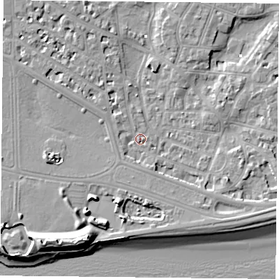 Shaded relief map of the ground around PO52LQ, computed from Environment Agency LiDAR. The ground here sits at about 2 m above sea level and falls 13 m across the surrounding 800 m. Surface water reaching this point runs off ground lying to the south-west, 10.5 m higher.