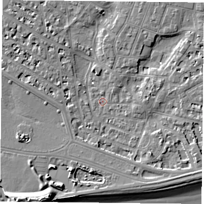 Shaded relief map of the ground around PO52ND, computed from Environment Agency LiDAR. The ground here sits at about 0 m above sea level and falls 13 m across the surrounding 800 m. Surface water reaching this point runs off ground lying to the east-south-east, 5.9 m higher.