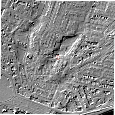 Shaded relief map of the ground around PO52QE, computed from Environment Agency LiDAR. The ground here sits at about 0 m above sea level and falls 9 m across the surrounding 800 m. Surface water reaching this point runs off ground lying to the south-east, 6.0 m higher.