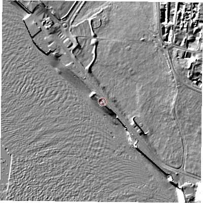 Shaded relief map of the ground around PO53AE, computed from Environment Agency LiDAR. The ground here sits at about 3 m above sea level and falls 9 m across the surrounding 800 m. The ground contributing surface water to this point lies to the east-south-east.