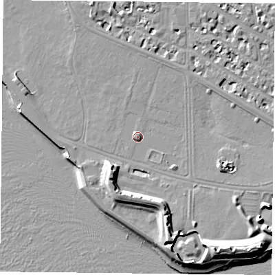 Shaded relief map of the ground around PO53PB, computed from Environment Agency LiDAR. The ground here sits at about 4 m above sea level and falls 13 m across the surrounding 800 m. Surface water reaching this point runs off ground lying to the south-west, 6.6 m higher.