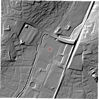 Shaded relief map of the ground around PO92NB, computed from Environment Agency LiDAR. The ground here sits at about 18 m above sea level and falls 21 m across the surrounding 800 m. The ground contributing surface water to this point lies to the east-north-east.