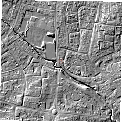 Shaded relief map of the ground around PO94DB, computed from Environment Agency LiDAR. The ground here sits at about 12 m above sea level and falls 11 m across the surrounding 800 m. Surface water reaching this point runs off ground lying to the north-north-east, 4.5 m higher.