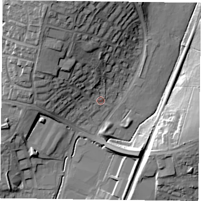 Shaded relief map of the ground around PO95QJ, computed from Environment Agency LiDAR. The ground here sits at about 20 m above sea level and falls 25 m across the surrounding 800 m. Surface water reaching this point runs off ground lying to the north-west, 18.2 m higher.