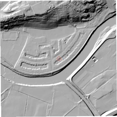 Shaded relief map of the ground around PR14PL, computed from Environment Agency LiDAR. The ground here sits at about 9 m above sea level and falls 34 m across the surrounding 800 m. Surface water reaching this point runs off ground lying to the south, 1.6 m higher.