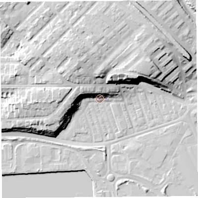 Shaded relief map of the ground around PR21BD, computed from Environment Agency LiDAR. The ground here sits at about 9 m above sea level and falls 24 m across the surrounding 800 m. Surface water reaching this point runs off ground lying to the north-west, 11.7 m higher.
