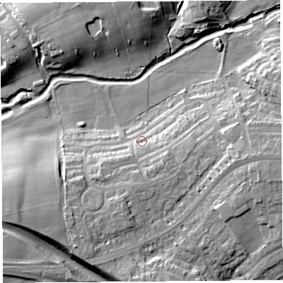 Shaded relief map of the ground around PR21XR, computed from Environment Agency LiDAR. The ground here sits at about 11 m above sea level and falls 16 m across the surrounding 800 m. Surface water reaching this point runs off ground lying to the south-south-west, 6.4 m higher.