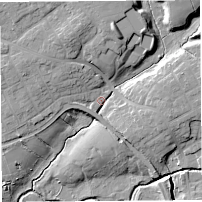 Shaded relief map of the ground around PR23TW, computed from Environment Agency LiDAR. The ground here sits at about 19 m above sea level and falls 17 m across the surrounding 800 m. Surface water reaching this point runs off ground lying to the south-east, 9.0 m higher.