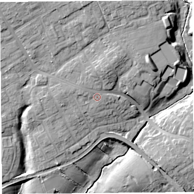 Shaded relief map of the ground around PR23TY, computed from Environment Agency LiDAR. The ground here sits at about 25 m above sea level and falls 16 m across the surrounding 800 m. Surface water reaching this point runs off ground lying to the north-north-west, 1.9 m higher.